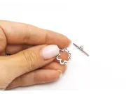 Inchizatoare toggle floare 20x13mm argintiu