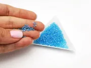 Toho rotunde 11/0 transparent rainbow aqua (5g)