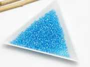 Toho rotunde 11/0 transparent rainbow aqua (5g)
