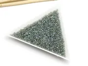 Toho rotunde 15/0 Transparent Rainbow Black Diamond (5g)