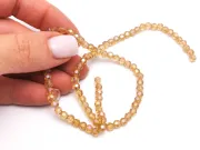 Margele cristal rotund fatetat 4mm auriu AB (sirag)