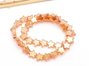 Margele sticla stea 9x8mm auriu roscat (sirag)