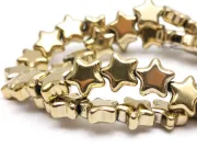 Margele sticla stea 9x8mm auriu (sirag)