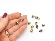 Briolete de cristal 11x8mm iris auriu mov