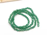 Margele cristal biconic 2x3mm verde opac lustered (sirag)