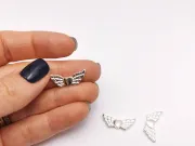 Margele metalice inima cu aripi 22x9x3mm argintiu