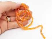 Margele cristal rondel fatetat 4x3mm portocaliu AB (sirag)