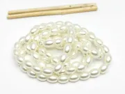 Perle de sticla ovale 8x6mm ivory (sirag)