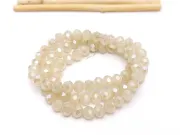 Margele cristal rondel fatetat 6x4mm nisipiu opal lustered (sirag)