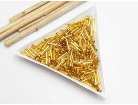 Toho bugle 9mm silver lined medium topaz (5g)