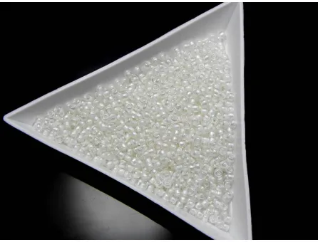 Toho rotunde 11/0 inside color rainbow crystal/creme lined (5g)