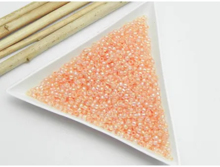 Toho rotunde 11/0 inside color rainbow crystal/apricot lined (5g)