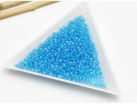 Toho rotunde 11/0 transparent rainbow aqua (5g)