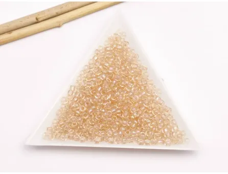 Toho rotunde 8/0 Transparent Rainbow Peach (5g)