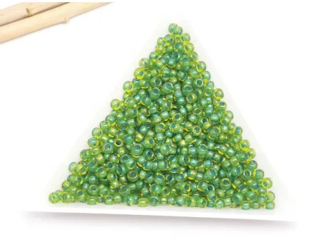 Toho rotunde 8/0 Inside Color Lime Green Opaque Green Lined (5g)