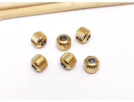 Margele otel inoxidabil 201 auriu cu striatii 6x5.5mm