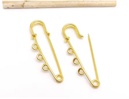 Ac de brosa cu trei bucle 50x14x7mm auriu