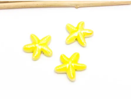 Margele de portelan stea de mare 18~17x6mm galben