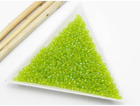 Toho rotunde 11/0 transparent rainbow lime green (5g)