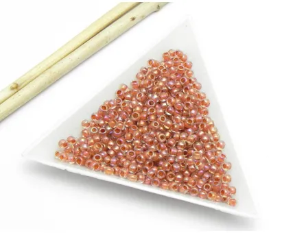 Toho rotunde 8/0 : inside color rainbow crystal lt mauve lined (5g)