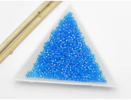 Toho rotunde 11/0 transparent rainbow dk aqua (5g)