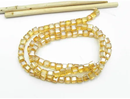Margele cristal cub fatetat 4mm auriu AB (sirag)