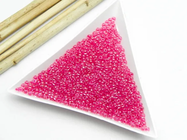 Toho rotunde 11/0 inside color crystal/fuchsia lined (5g)