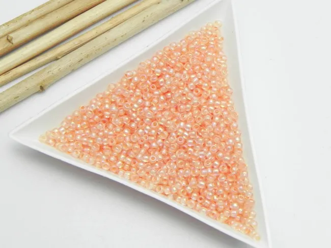 Toho rotunde 11/0 inside color rainbow crystal/apricot lined (5g)