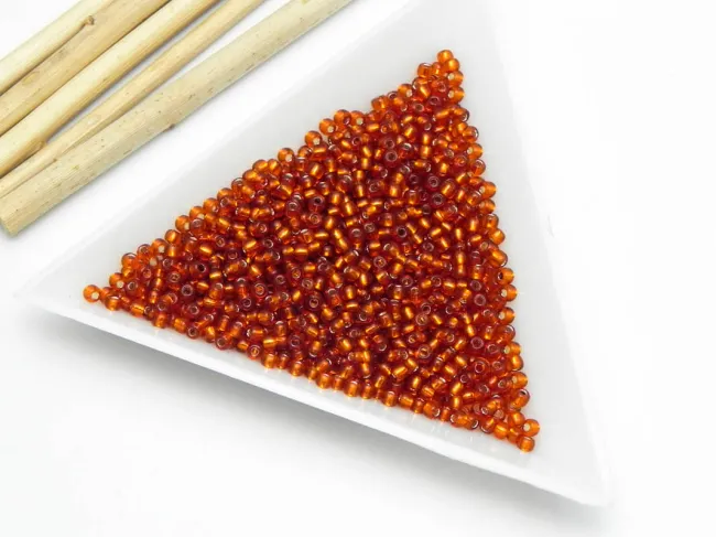Toho rotunde 11/0 silver lined burnt orange (5g)
