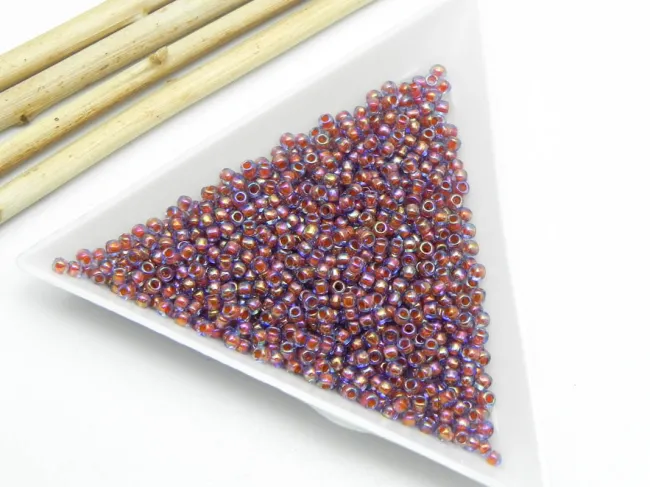 Toho rotunde 11/0 inside color rainbow alexandrite/opaque orange (5g)