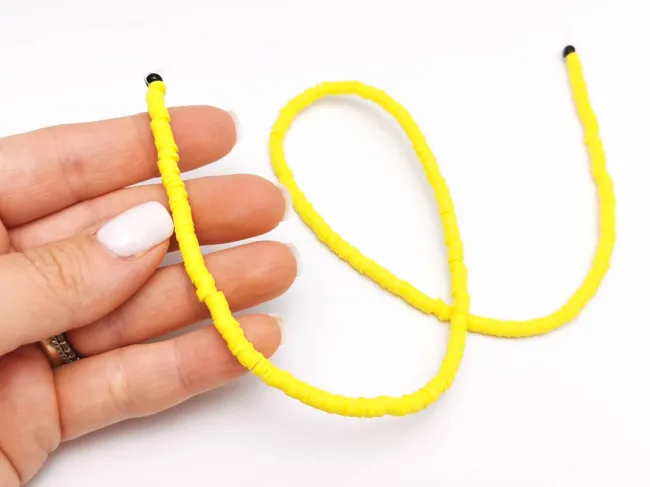 Sirag margele fimo 4x1mm galben