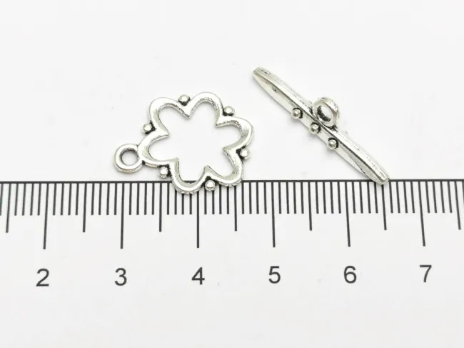 Inchizatoare toggle floare 20x13mm argintiu