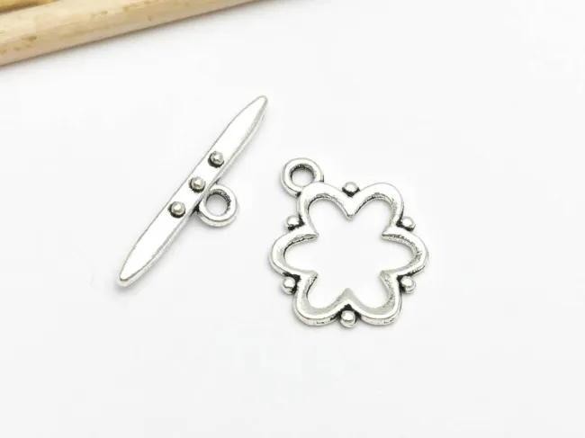 Inchizatoare toggle floare 20x13mm argintiu