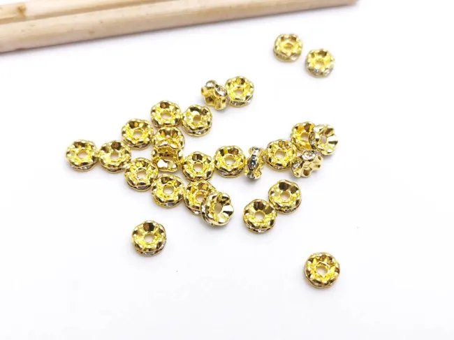 Distantiere cu rhinestone ondulat 5mm auriu