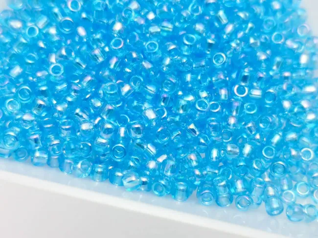 Toho rotunde 11/0 transparent rainbow aqua (5g)