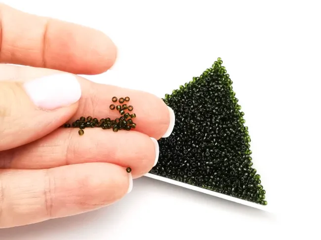 Toho rotunde 15/0 transparent olivine (5g)