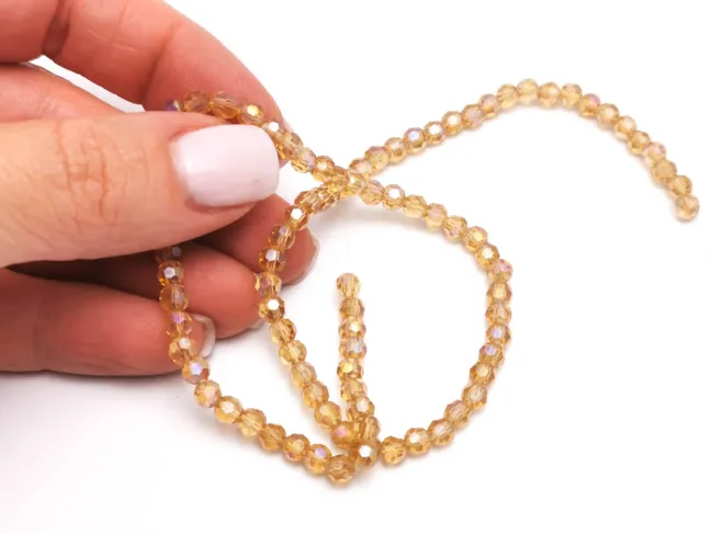 Margele cristal rotund fatetat 4mm auriu AB (sirag)