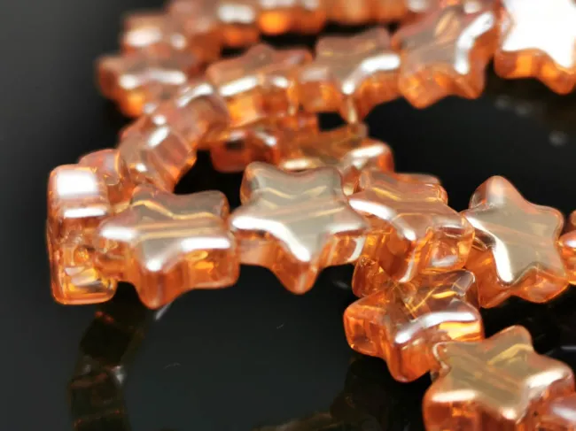 Margele sticla stea 9x8mm auriu roscat (sirag)