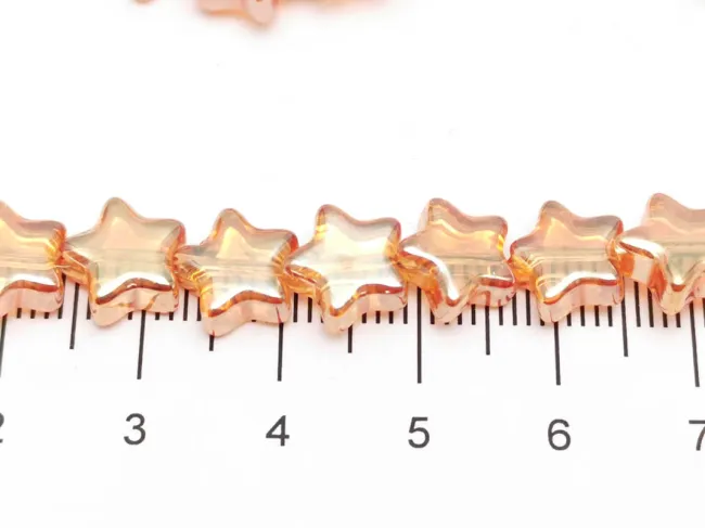 Margele sticla stea 9x8mm auriu roscat (sirag)