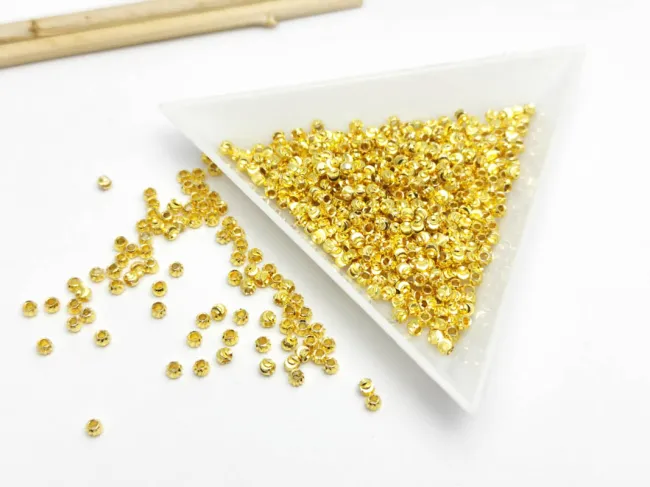 Margele de alama decorative cu striatii 2x1.8mm placate cu aur 14K (10buc)