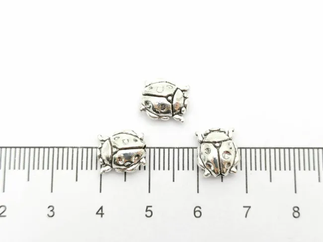 Margele metalice 10x8.5mm buburuza