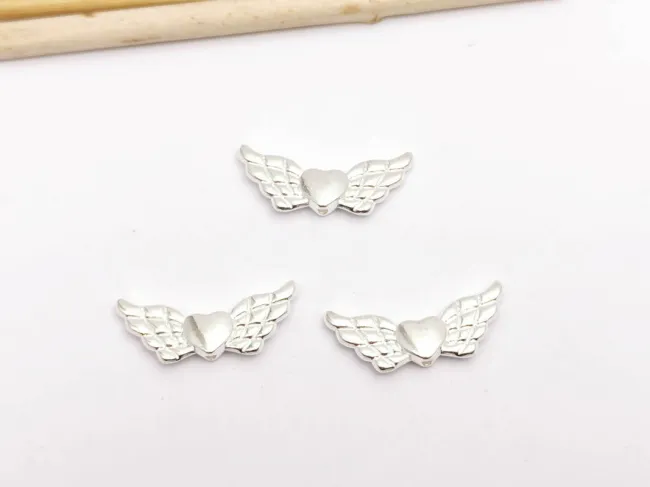 Margele metalice inima cu aripi 22x9x3mm argintiu