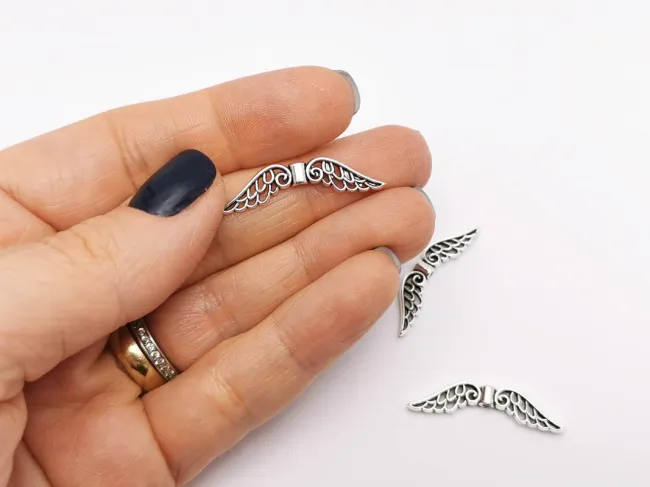 Margele metalice aripi 30x7.5mm argintiu