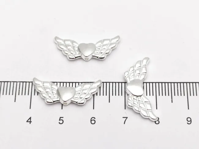 Margele metalice inima cu aripi 22x9x3mm argintiu