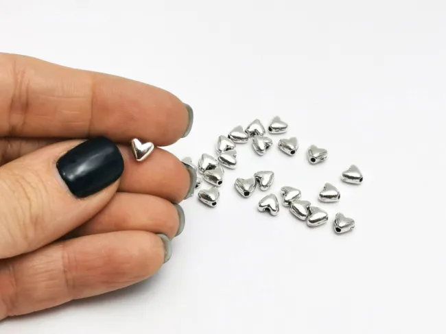 Margele metalice inima 6x5mm argintiu (10buc)