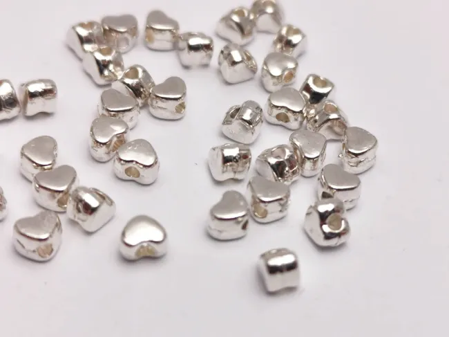 Margele metalice inima 4x3.5mm argintiu (25buc)