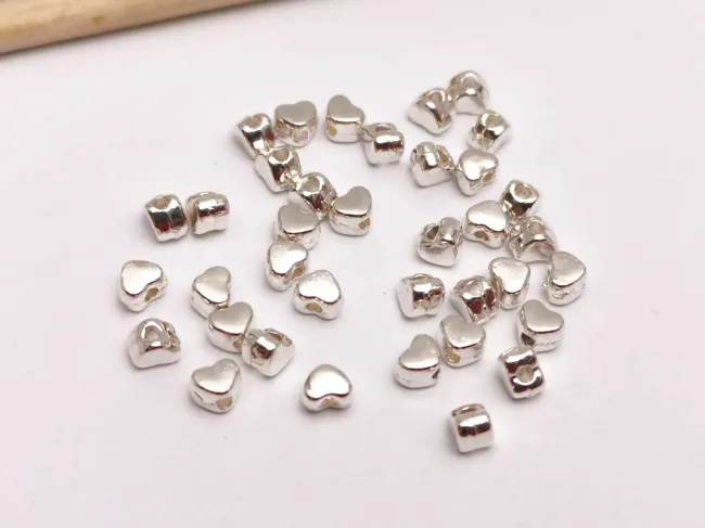 Margele metalice inima 4x3.5mm argintiu (25buc)