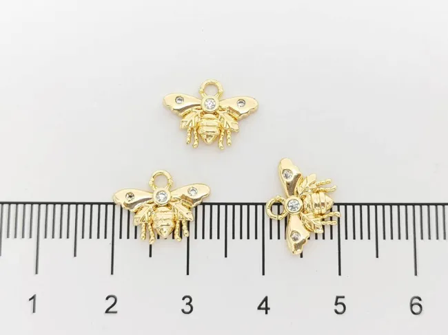 Charm albina din cubic zirconia 12.5x9mm auriu