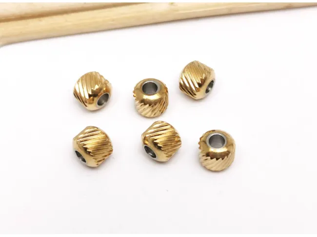 Margele otel inoxidabil 201 auriu cu striatii 6x5.5mm