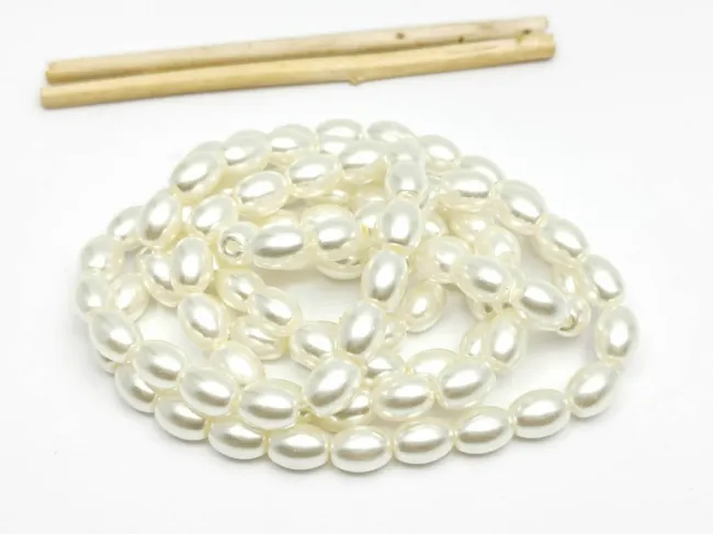 Perle de sticla ovale 8x6mm ivory (sirag)